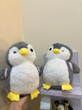 Plushie penguin with removable bagpack