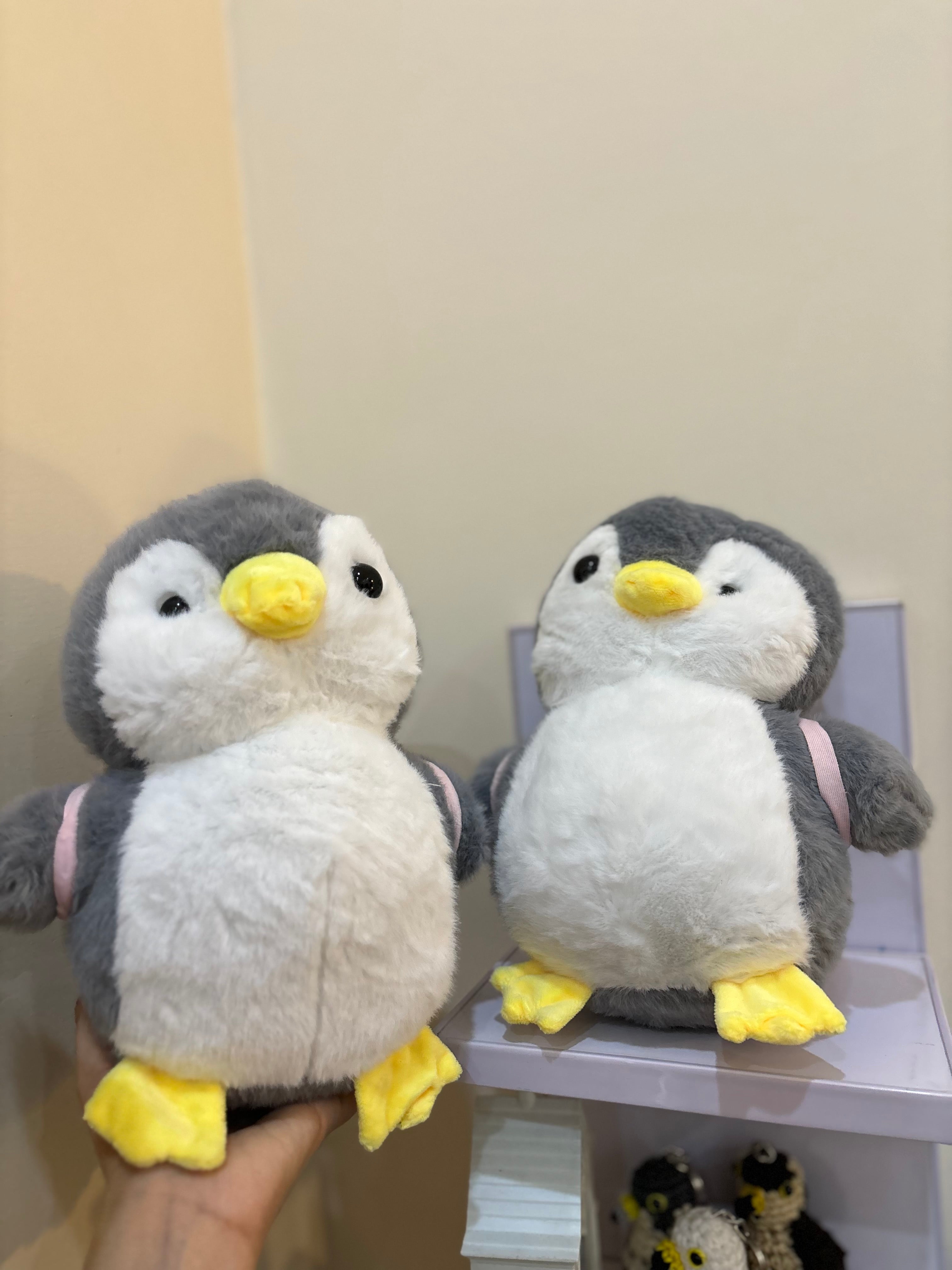 Plushie penguin with removable bagpack